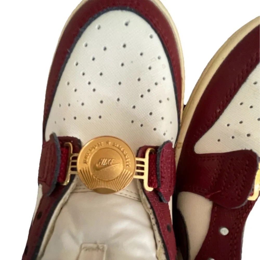 Nike Women’s White and Burgundy Sneakers with Gold Accents